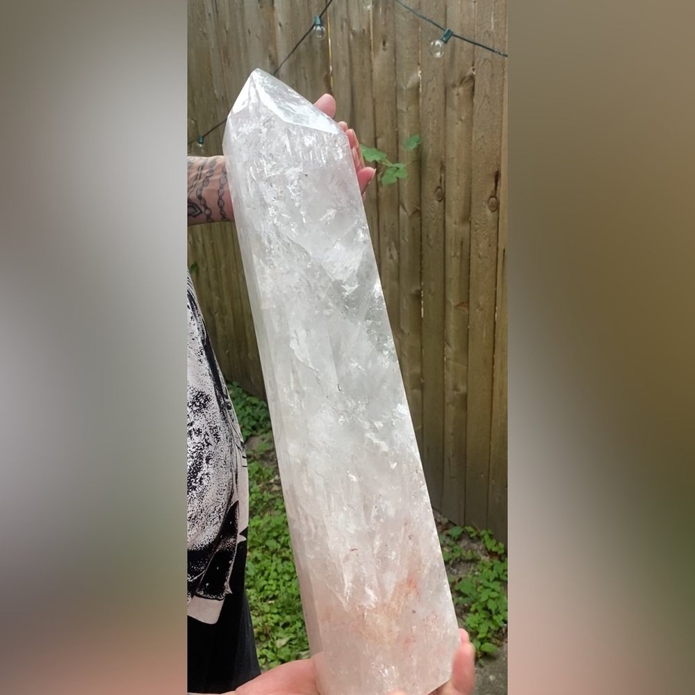 Cracked Quartz tower 20 pound with rainbow spots all over the obelisk 19” tall